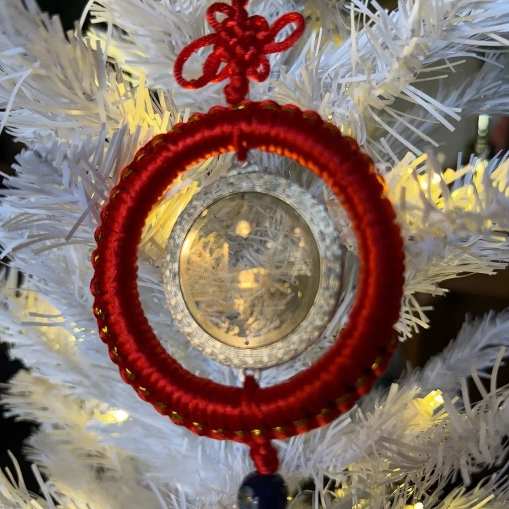 Chinese Feng Shui lucky coin hanging charm with a red knot and tassel Ornament